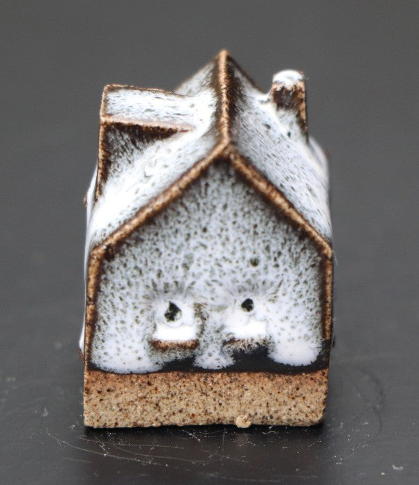 Huis klein blauw-wit