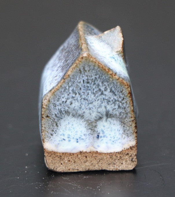Huis klein blauw-wit