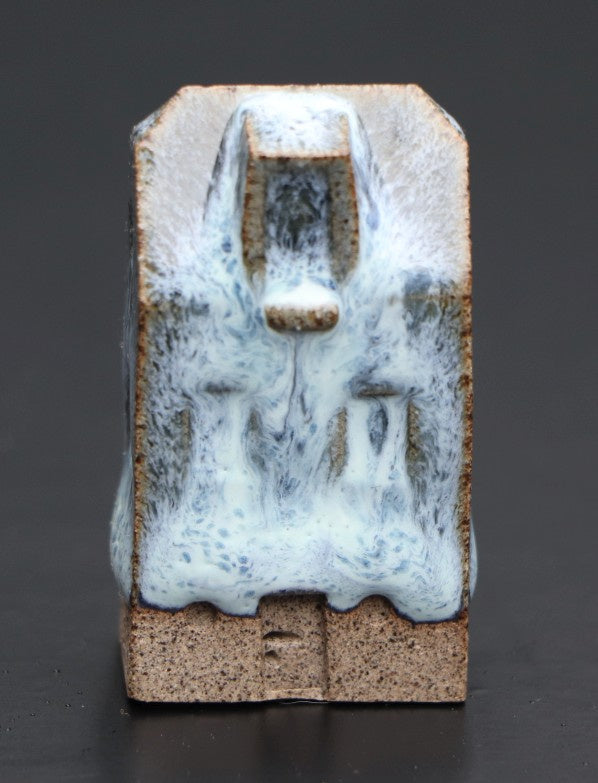 Huis klein blauw-wit