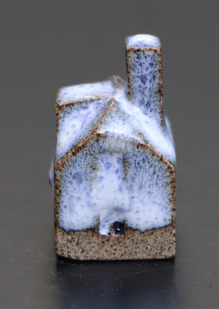 Huis klein blauw-wit