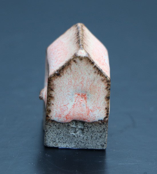 Huis klein oranje roze