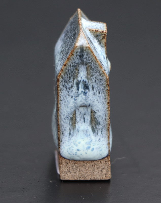 Huis klein blauw-wit