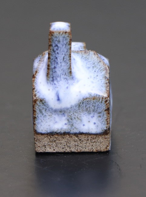Huis klein blauw-wit