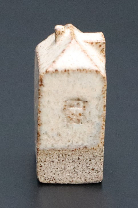 Huis klein beige