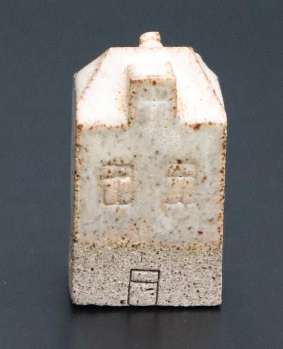 Huis klein beige