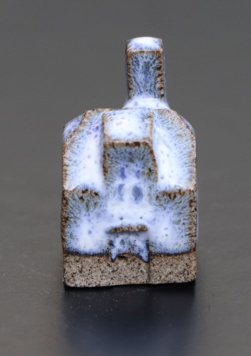 Huis klein blauw-wit