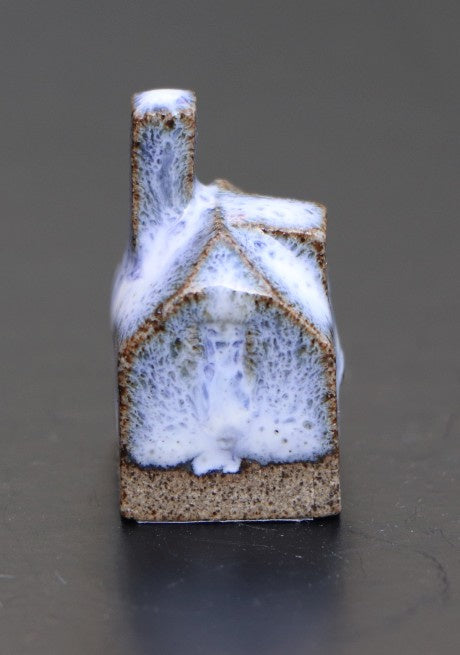 Huis klein blauw-wit