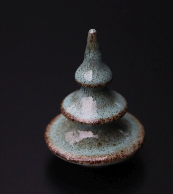 Boom klein blauwgroen